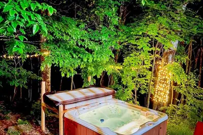 Image de Log cabin w hot tub View near of Tremblant