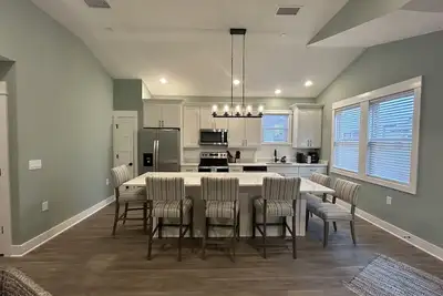 Brand New Single Level Condo, Steps from the Beach