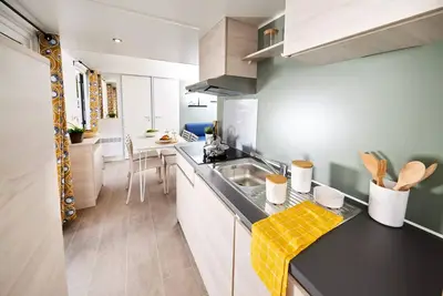 Image de Homeflower Premium 29m² (2 chambres) + terrasse couverte 4 personnes