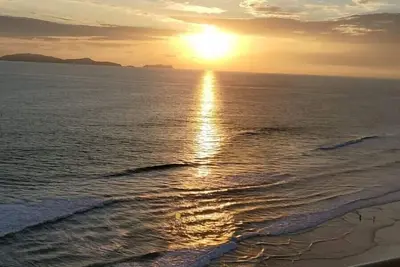 Relaxed Spanish beachfront condo w/private parking & private balcony ocean views