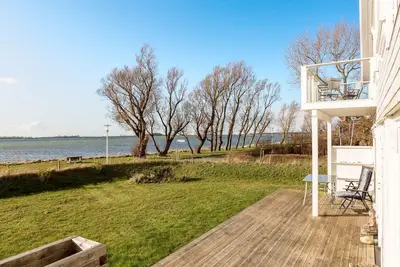 Image de Fewo \" Strandhaus Wiek \" direkt am Wasser mit herrlichen Weitblick