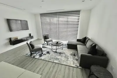 Image de Blu at Villa Nova. <br>Stylish Modern Condo, Minutes away from the Beach.