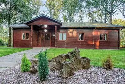 Image de Newly renovated for Summer 2020. Superior lodge with rustic feature wooden beams.