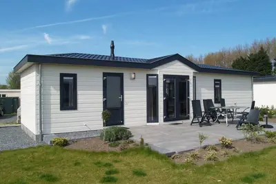 Image de Chalet avec 3 chambres à coucher et une terrasse