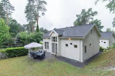 Image de Chalet avec 5 chambres à coucher et 2 salles de bain
