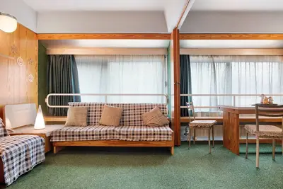 Image de Appartement \"Nives\" avec vue sur les montagnes, piscine intérieure & Wi-Fi