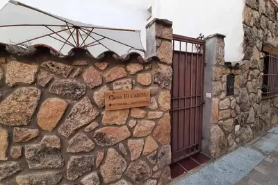 House with patio and fireplace in Piedralaves