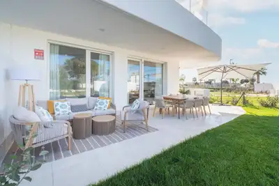 Image de Spectacular first floor with garden 3 min from the beach, luxury, pool and premium areas.