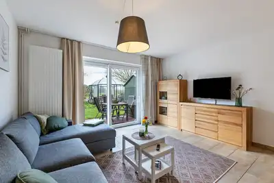 Image de Appartement Gartenglückchen près de la mer avec jardin et Wi-Fi.