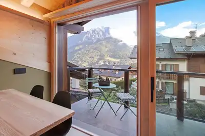 Image de Appartement \"Aria di Casa Reit\" avec vue sur les montagnes, jardin partagé et Wi-Fi.