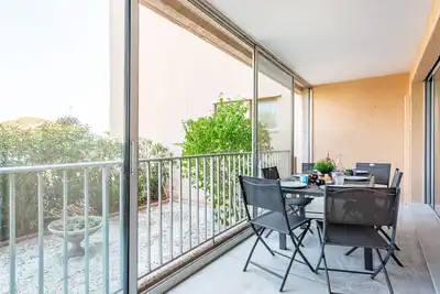 Image de Confortable appartement avec climatisation, piscine, Wifi, Tv, patio, animaux admis et parking