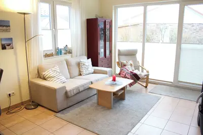 Image de Bright 60 m² vacation home for 4 people and dog with garden, beach chair and fireplace