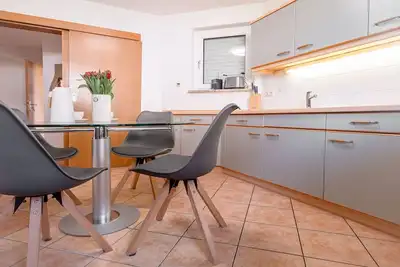 Image de Haus 5 Elemente- Fewo Erde mit Terrasse und Bio-Kamin - Fewo Erde mit Terrasse und Bio-Kamin