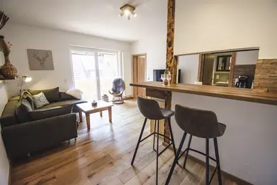 Image de New, romantic Rotmilan holiday apartment with a view of the mountains