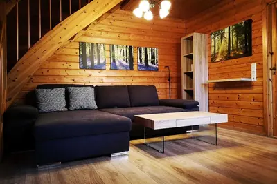 Image de Has-26 Holzblockhaus, 4-6 Pers. , 65qm - Naturerlebnisdorf Blauvogel