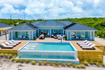 Image de Luxury beachfront villa with dock and a private large heated pool. For 10 people