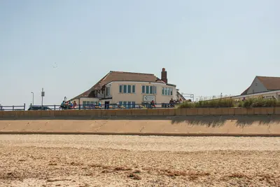 Image de Overlooking the beach, literally a few steps, and you arrive at the sandy beach.