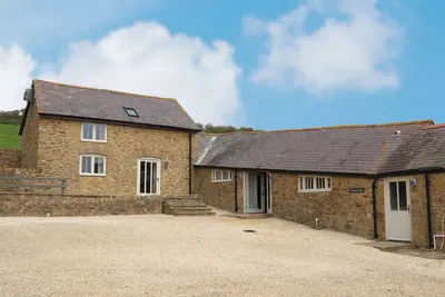 Image de Clayhanger Lodge is a spacious, converted detached barn