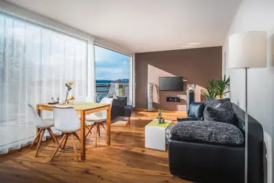 Image de Exclusive vacation apartment with balcony, 2 rooms 55m², direct hiking trails, close to the lake