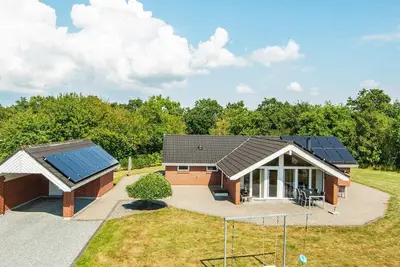 Image de Maison de vacances pour 8 a Oksbøl-By Traum