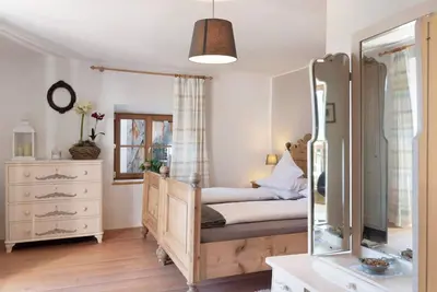 Image de Appartement de vacances historique Huber Stube avec vue sur la montagne, balcon et Wi-Fi