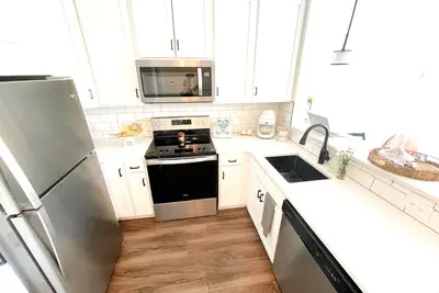Image de Chic 2-bedroom townhome w\/private rooftop in Tc - walk everywhere!