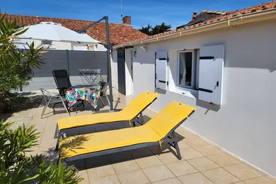 Image de Charmante maison rénovée avec jardin commun, proche plage et commerces, idéale pour 2 personnes