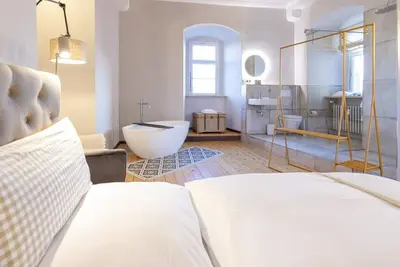 Image de The historic castle tower in Kirchberg boasts spectacular views, parquet flooring, stucco and a modern interior