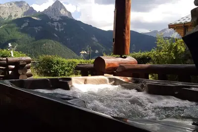 Image de Chalet en rondin 8 pers. avec sauna, Spa et garage, près télécabine et navette à Praloup 1500