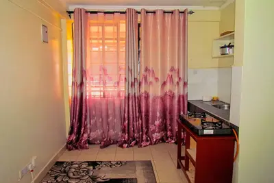 Image de Spacious studio with hot shower and Free Wi-Fi and it is a noise free zone.