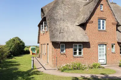 Image de A huge apartment with garden in Norddorf and a great view over to the sea