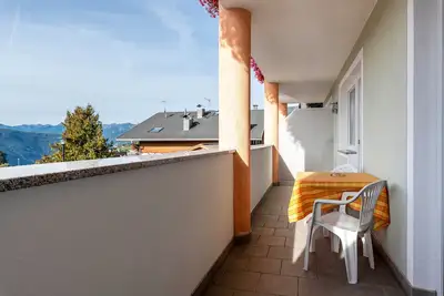 Image de Résidence Diana Appartement 102 avec vue sur les montagnes, balcon et Wi-Fi.