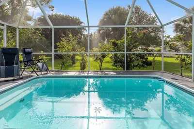 Image de Relaxing 4 bedroom home with heated Pool