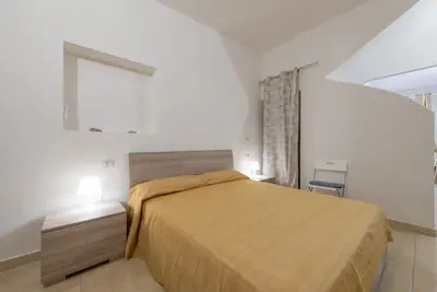 Image de Maison de vacances Casa Vacanze Regina Margherita T avec terrasse couverte