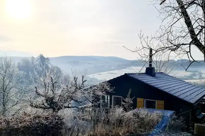 Image de Behagliches Cottage mit Holzfeuer und Baumwipfelblick am Rande des Sauerlandes