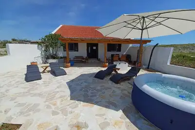 Image de Maison de vacances Ražanac pour 1 - 5 personnes avec 2 chambres à coucher - Maison mitoyenne