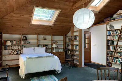 Airy, book-lined cottage on historic seaside estate with private beaches & more