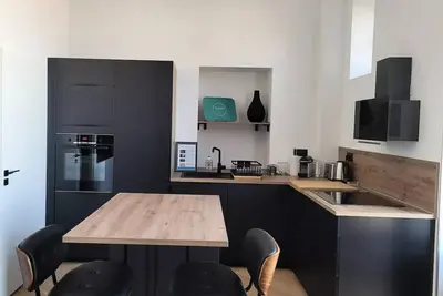 Image de Chaleureux appartement dans ancien palace!