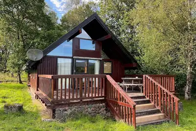 Image de Charming log cabin with stunning views over Loch Awe. Electric hot tub