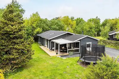 Image de Maison de vacances pour 8 a Rødby-By Traum