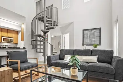 Image de Spiral Stairs to Loft Bedroom + Balcony with Shade