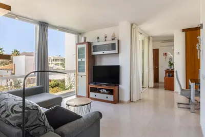 Image de Appartement de vacances Llenaire cerca playa avec vue sur les montagnes, piscine partagée et Wi-Fi.
