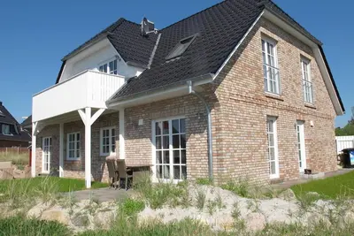 Image de Freetiet Achtern Diek - modern apartment in a quiet residential area