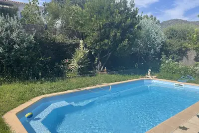 Image de Studio au rez-de-chaussée d'une villa avec accès Piscine/Terrasse.