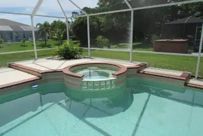 Image de Stunning Sandpiper Bay Home. Heated Pool and Spa.