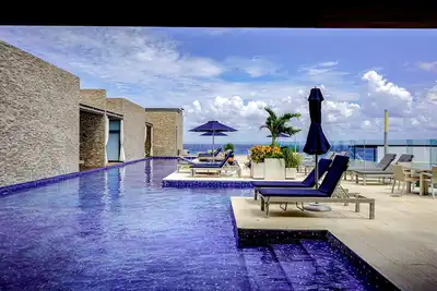 Image de Dream getaway near the beach and city with pool, balcony, gym, fast WiFi & W/D