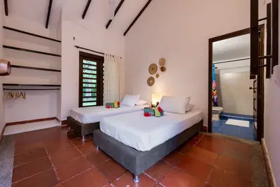 Image de Our Forest lodge consists of 7 rooms, a mandala-style garden