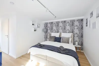 Image de Wohnträumerei Design Apartment mit Netflix, kostenloses Wlan, Boxspringbett