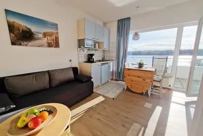 Image de Diese Gemütliche Kleine Wohnung Befindet Sich in der 1