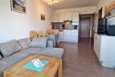 Image de Family apartment with sweeping views of the old town across the inland lake